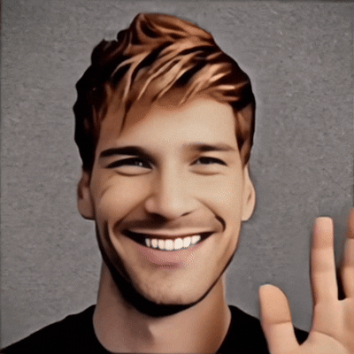 Portrait of Nicholas (Nick) Christian smiling while greeting visitors with a waving hand.